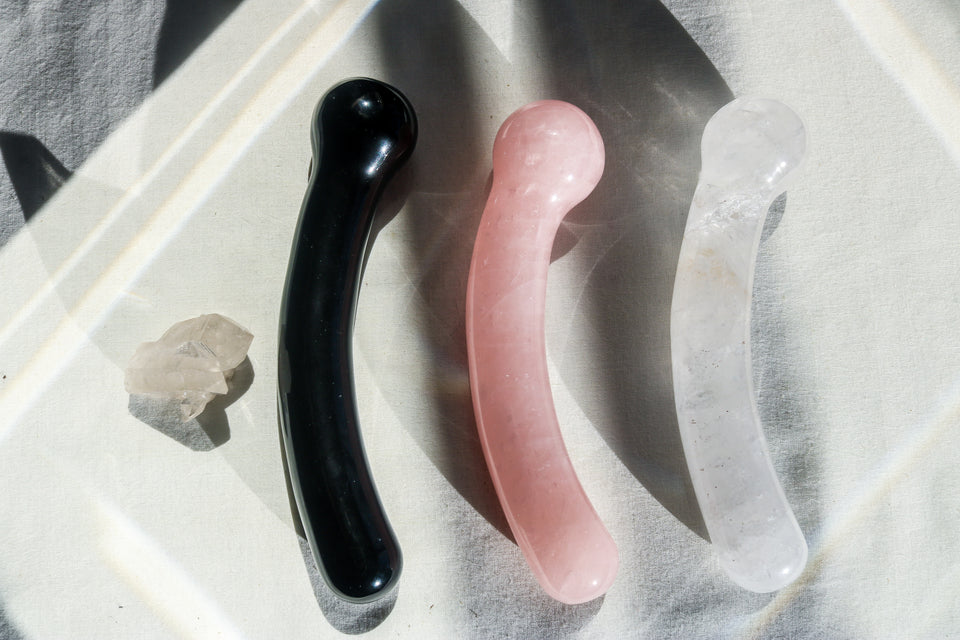 Crystal pleasure wands: rose quartz, clear quartz and obsidian dildo